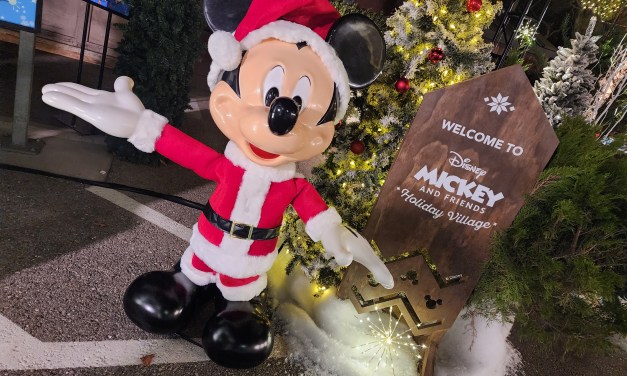 Singing Mickey animated figure welcomes you to special Mickey and Friends Holiday Village one-weekend-only shopping event
